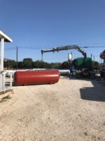 new load of 1000 gallon underground tanks ca 1.jpg